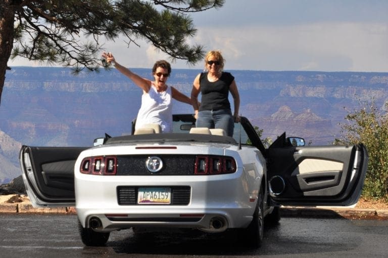 'Thelma and Louise' in a Mustang on the edge of the Grand Canyon, Arizona